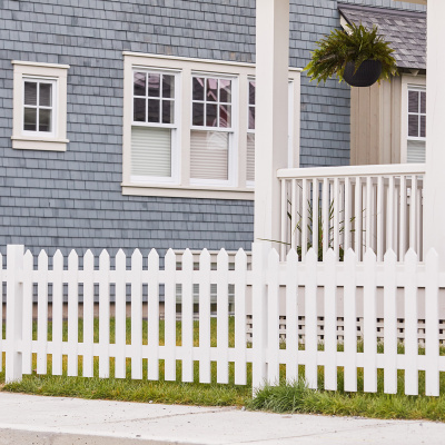 Picket fence blue house